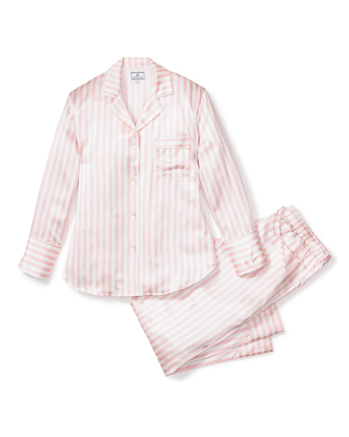 The Womens Silk Pajama Set in Pink Stripe by Petite Plume features a long-sleeve button-up top with a chest pocket and matching drawstring pants, made from luxury materials, all displayed on a white background.