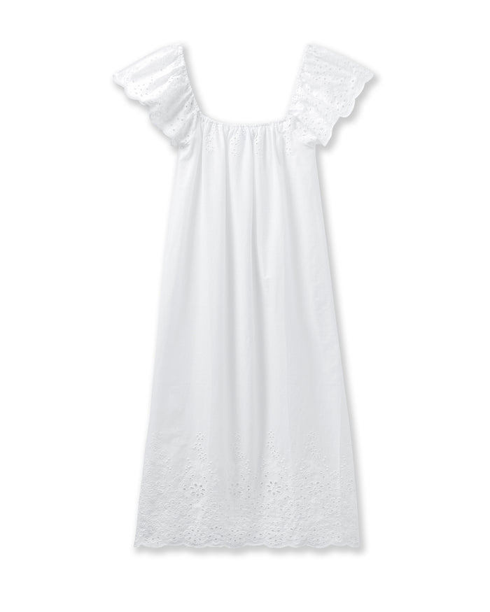 The Womens Twill Ava Nightgown in White by Petite Plume features ruffled eyelet lace cap sleeves, a loose fit, and delicate embroidery. Its airy fabric evokes timeless comfort and the elegant style of vintage cotton sleepwear.
