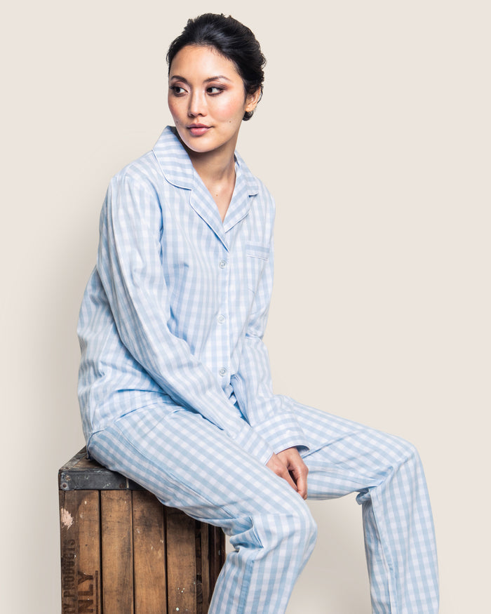 Close-up of Petite Plumes Womens Twill Pajama Set in Light Blue Gingham fabric featuring an elastic waistband and a white, textured drawstring tied in a bow at the front.