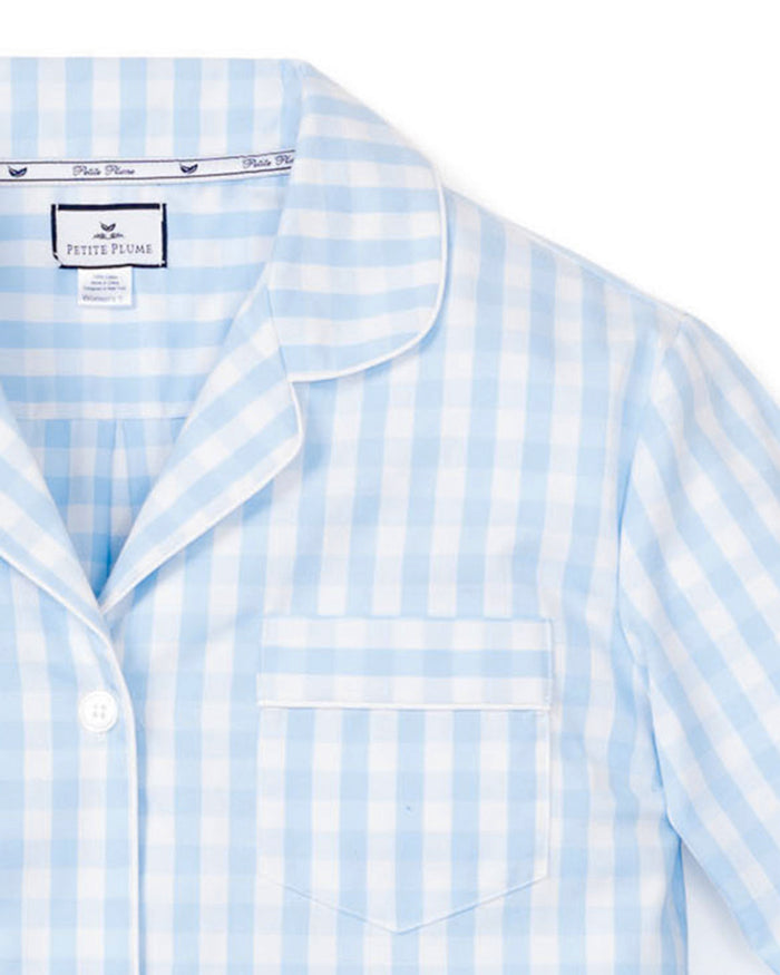 Close-up of Petite Plumes Womens Twill Pajama Set in Light Blue Gingham fabric featuring an elastic waistband and a white, textured drawstring tied in a bow at the front.