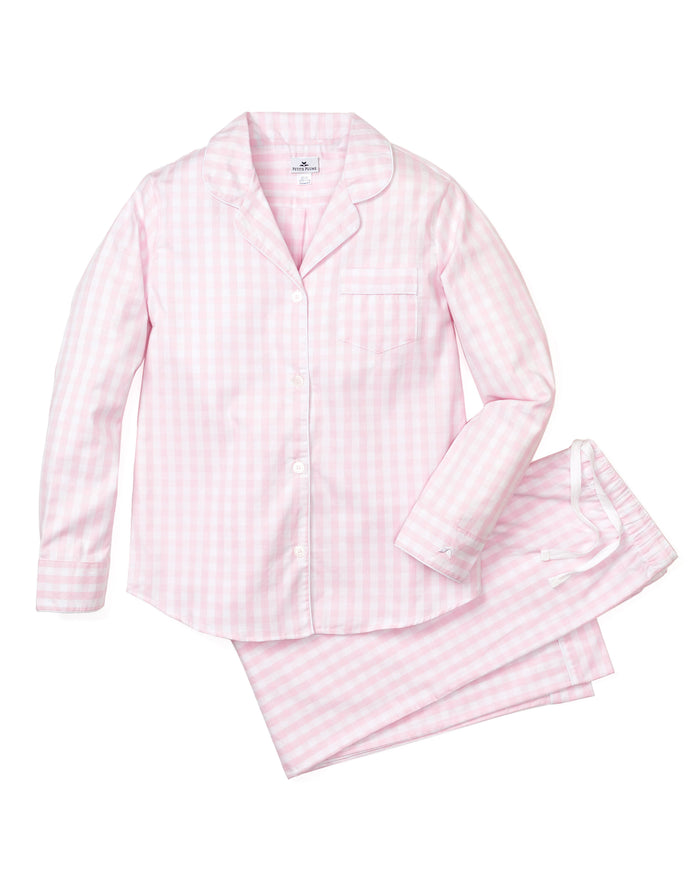 Women's Twill Pajama Set in Pink Gingham features a long-sleeve button-up top with a chest pocket and matching drawstring pants, shown laid flat on a white background.