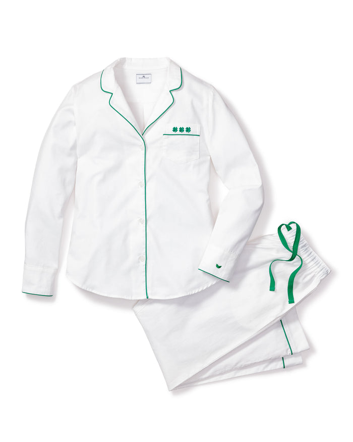 Part of the Shamrocks Collection, Petite Plumes limited edition Womens Twill Pajama Set boasts a white design with green piping, featuring a long-sleeve button-up top with an embroidered clover pocket and matching pants with a fashionable green drawstring.